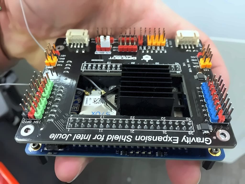A DFRobot Gravity Expansion Shield for Intel Joule, its colour-coded header blocks surrounding the module's black heatsink